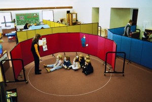 Four room dividers used to separate a daycare into smaller classrooms