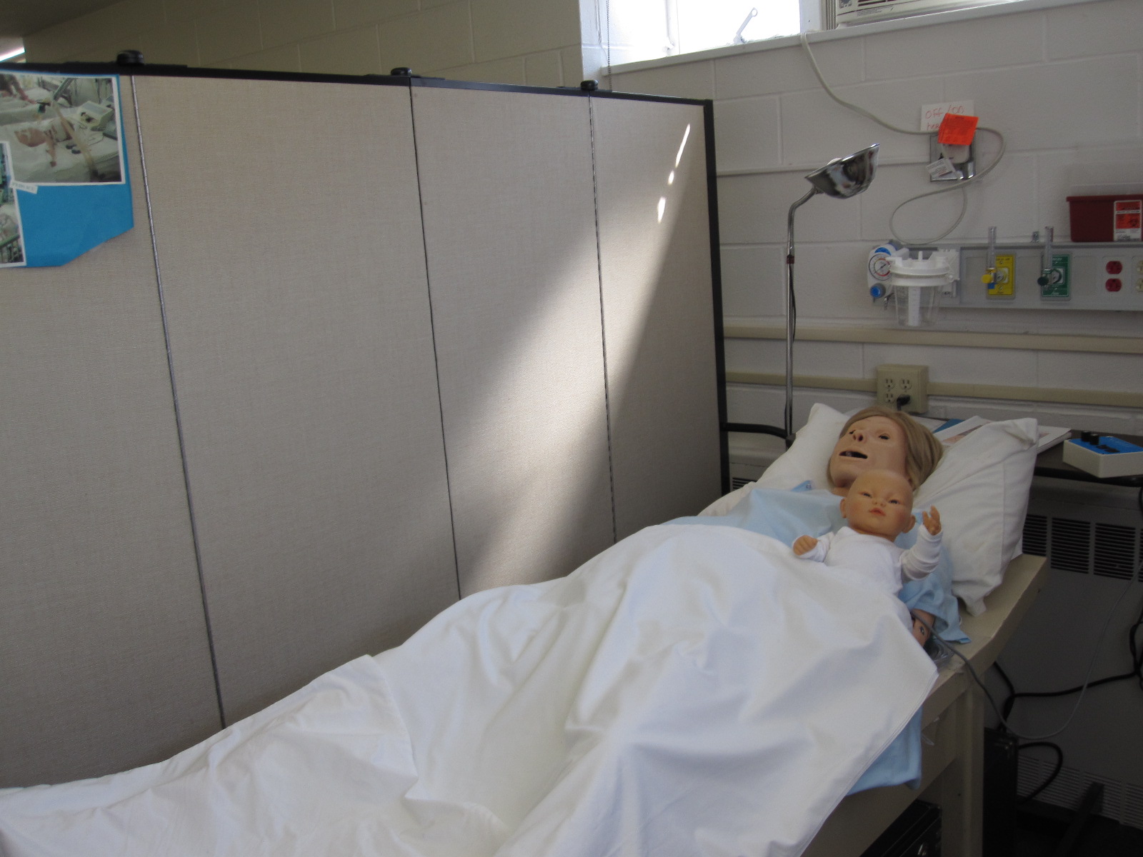 Nursing School Portable Screen Dividers separate simulated patients in a classroom