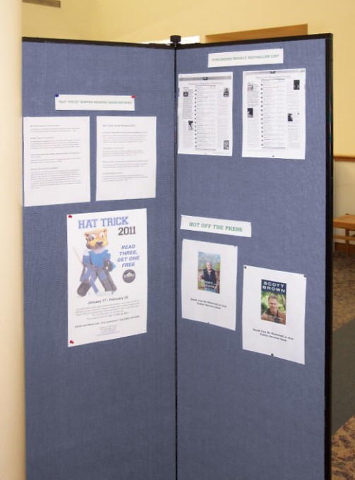 Tack items to a library display board