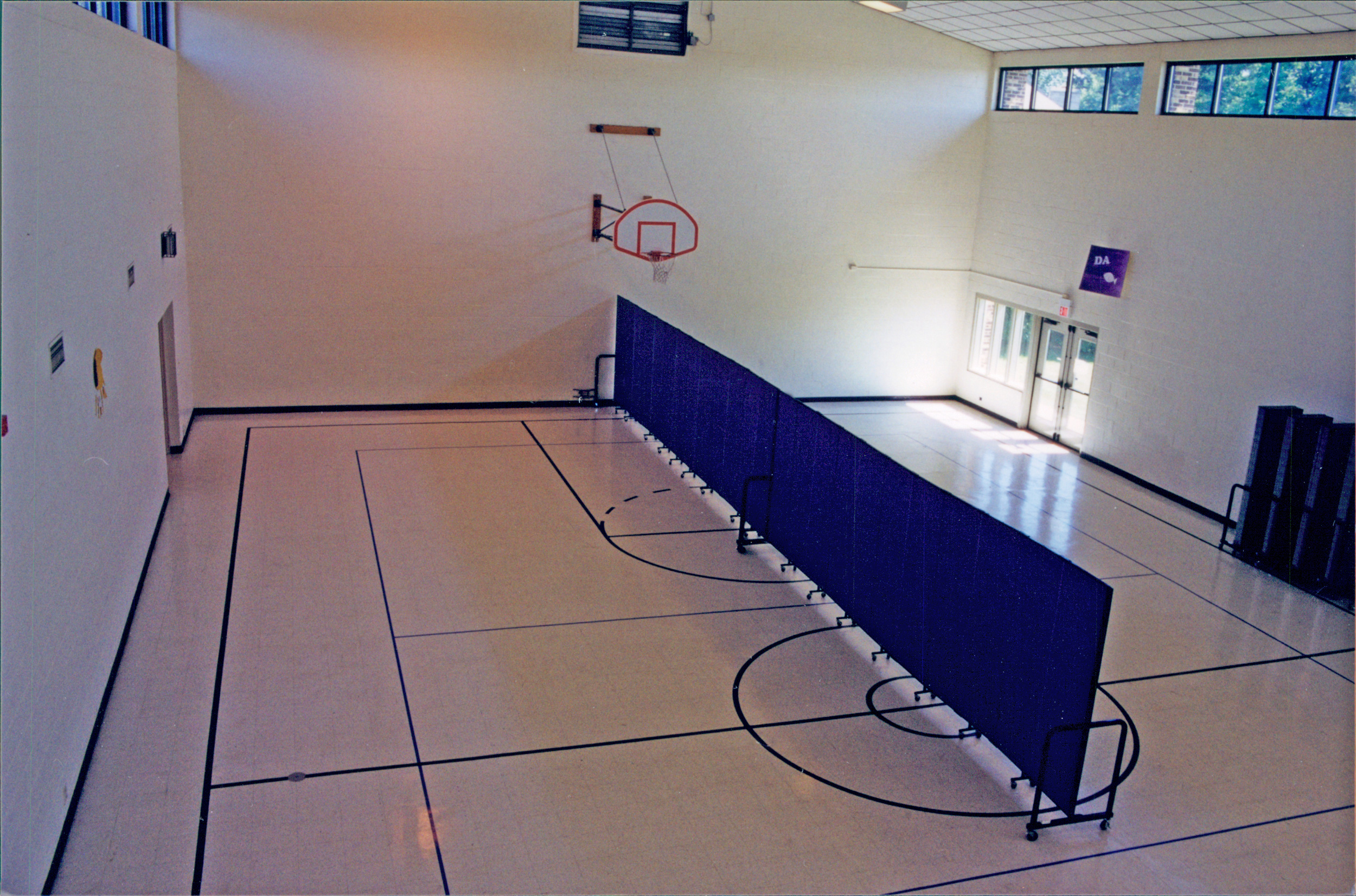 Gym is first divided in half lengthwise using two 24'-1" long dividers