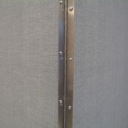 Piano hinge connects two panels of a room divider
