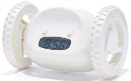 A white alarm clock with wheels on each side
