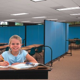 A female student does homework in a tuturing center
