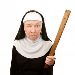 Stern Looking Nun with Ruler