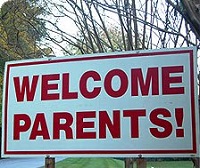 Welcome parents sign along side a road.
