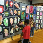students viewing an art exhibit