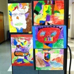 Children's Picasso drawongs at an art display