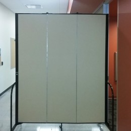 Sound absorbing panel in a hallway
