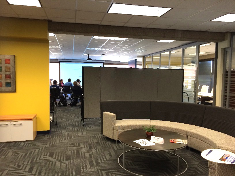 Marian University Media Center is divided by a room divider to create a private reception room